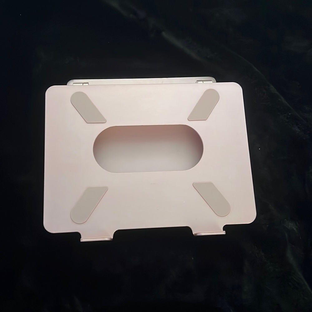 Computer stand for MacBook Air or iPads.